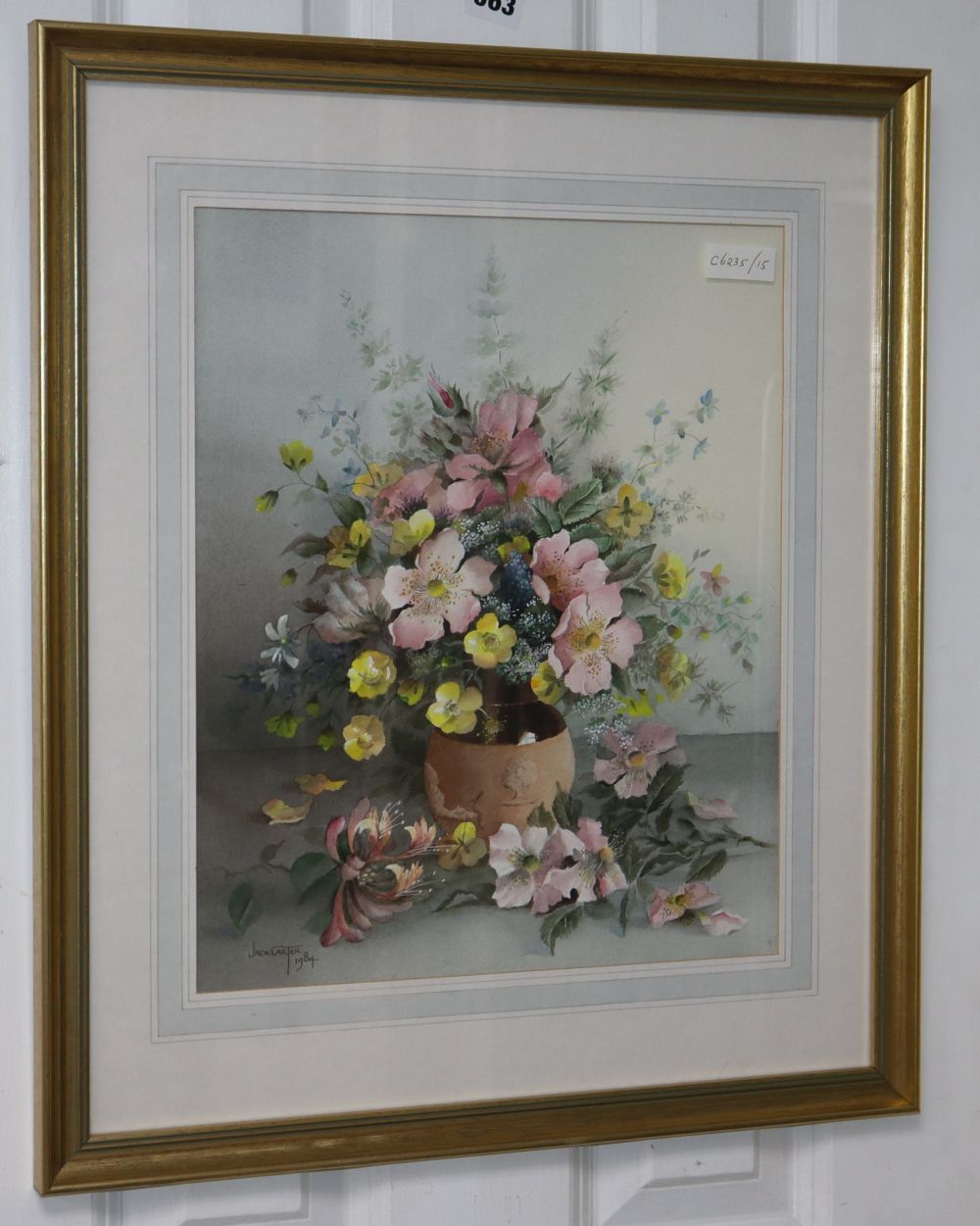 Jack Carter, watercolour, Still life of flowers in a stoneware vase, signed and dated 1984, 38 x 31cm